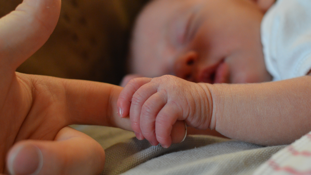 Baby Holding Finger