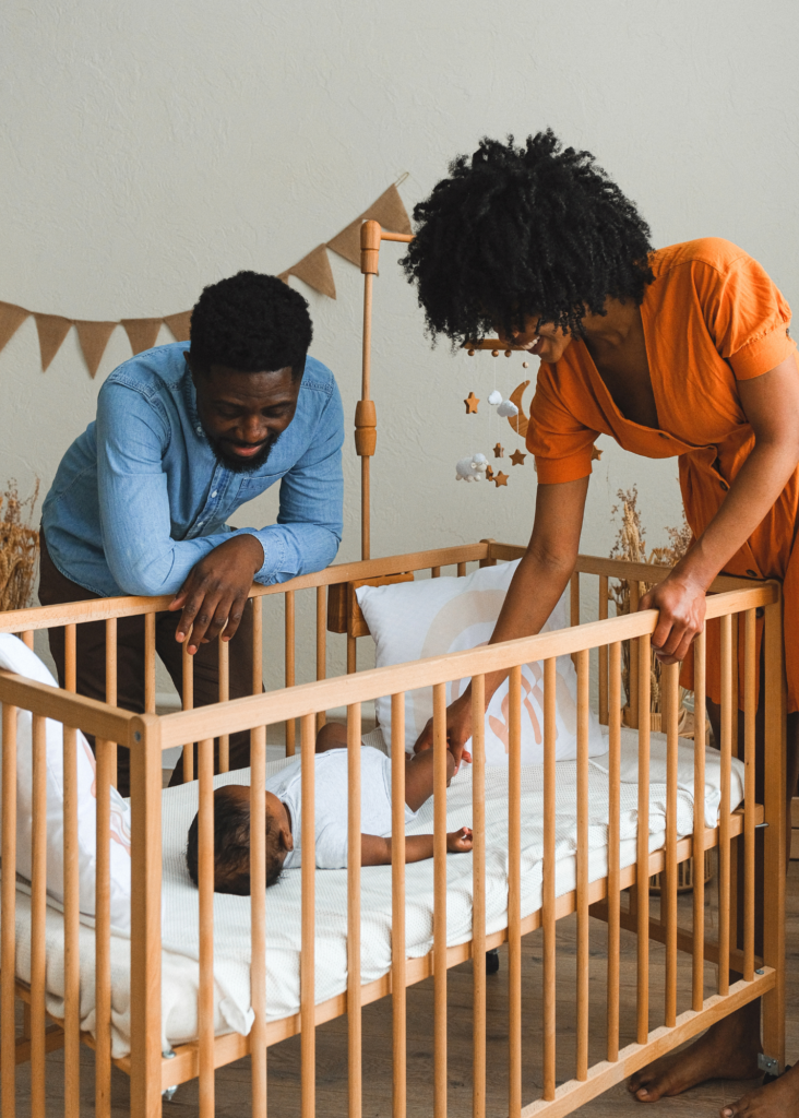Newborn Family In Crib