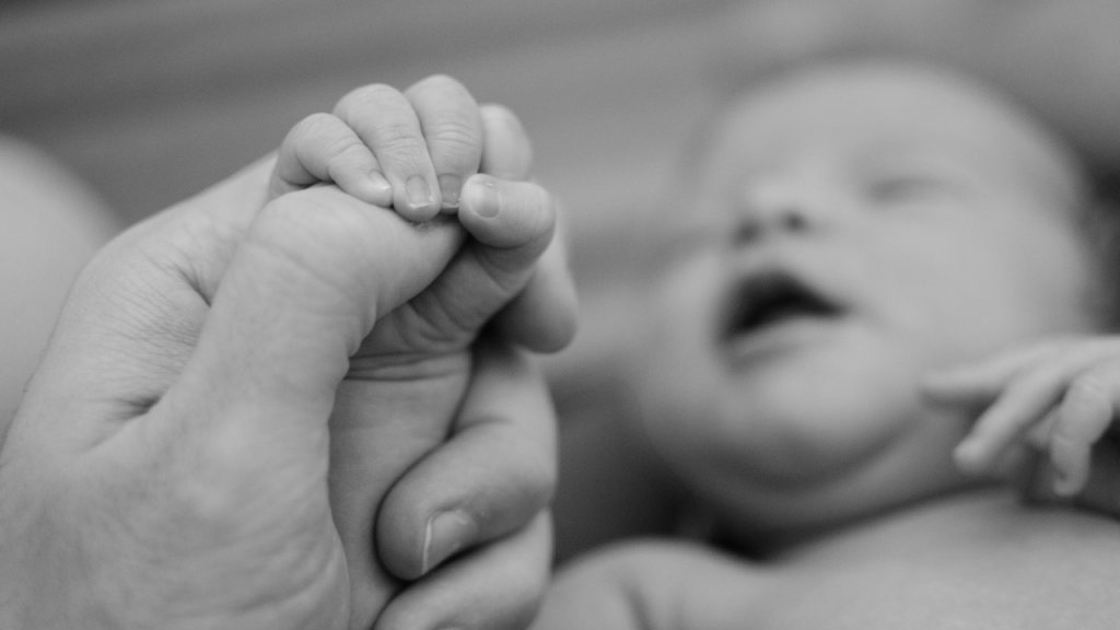 infant holding